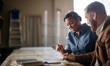 counselor taking notes during a session